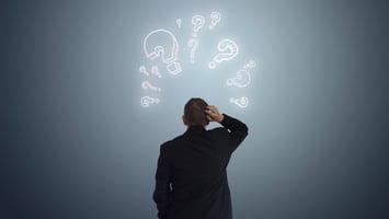 Confused employer evaluating questions about sponsoring overseas workers in Australia