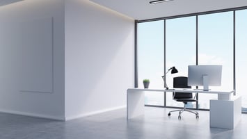 Minimalist modern office setup for employer or migration consultant in corporate environment